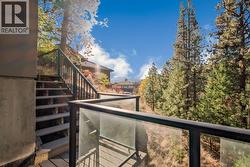 Stairs from lower patio to upper level -