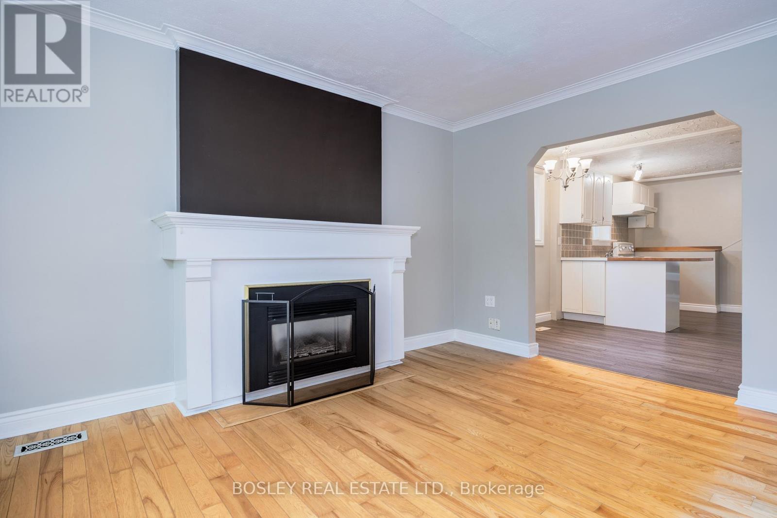 651 Cosburn Avenue, Toronto, ON - Indoor Photo Showing Living Room With Fireplace