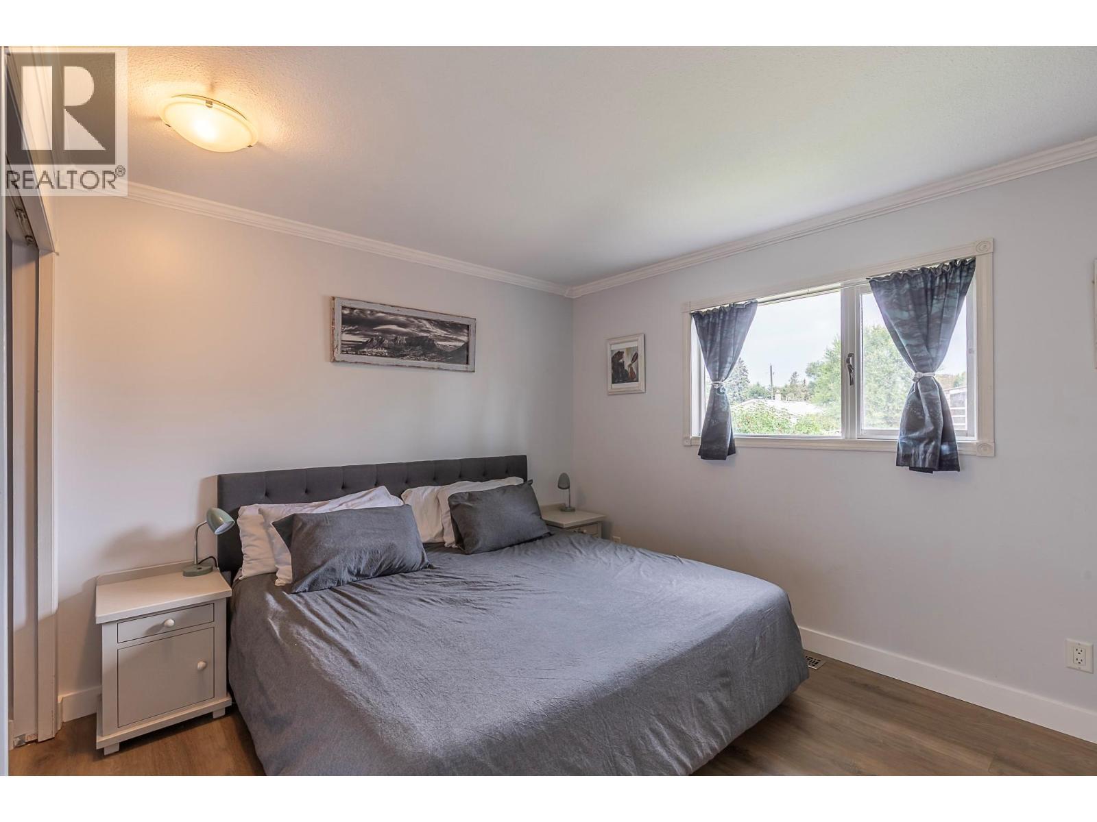 Primary bedroom - 2401 40 Avenue, Vernon, BC - Indoor Photo Showing Bedroom