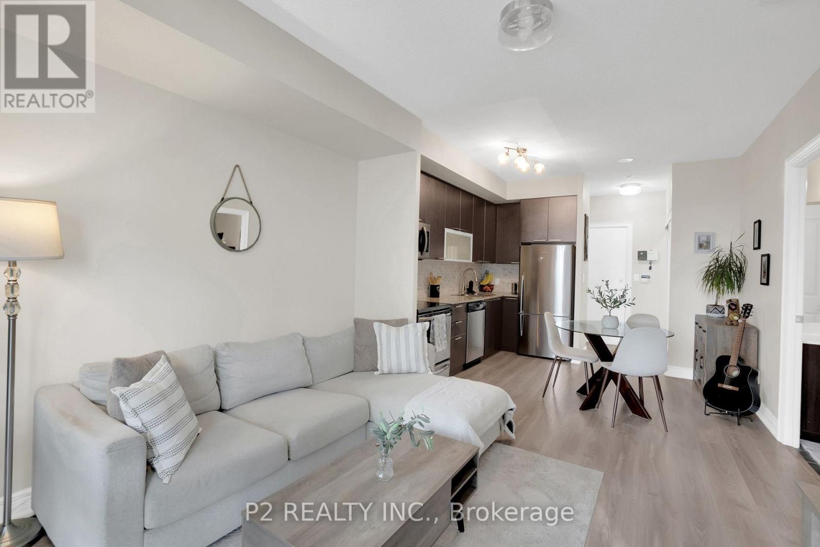 1002 - 16 Brookers Lane E, Toronto, ON - Indoor Photo Showing Living Room
