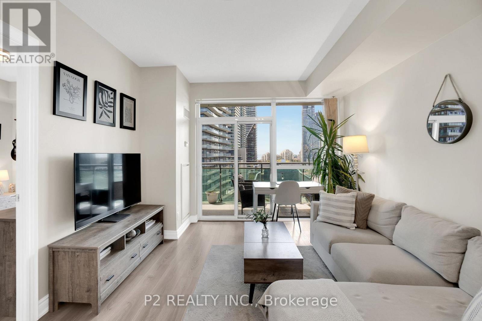 1002 - 16 Brookers Lane E, Toronto, ON - Indoor Photo Showing Living Room