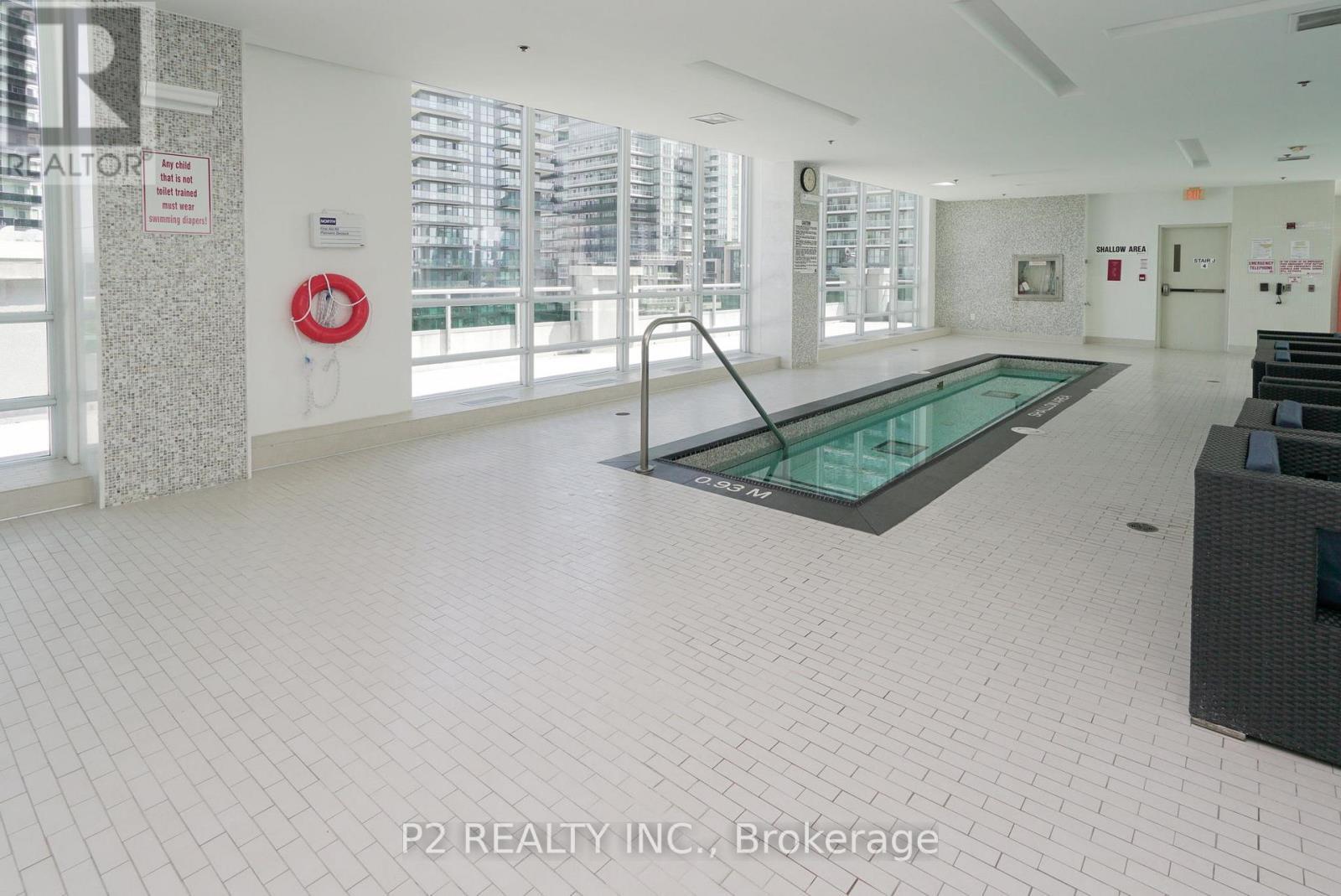 1002 - 16 Brookers Lane E, Toronto, ON - Indoor Photo Showing Other Room With In Ground Pool