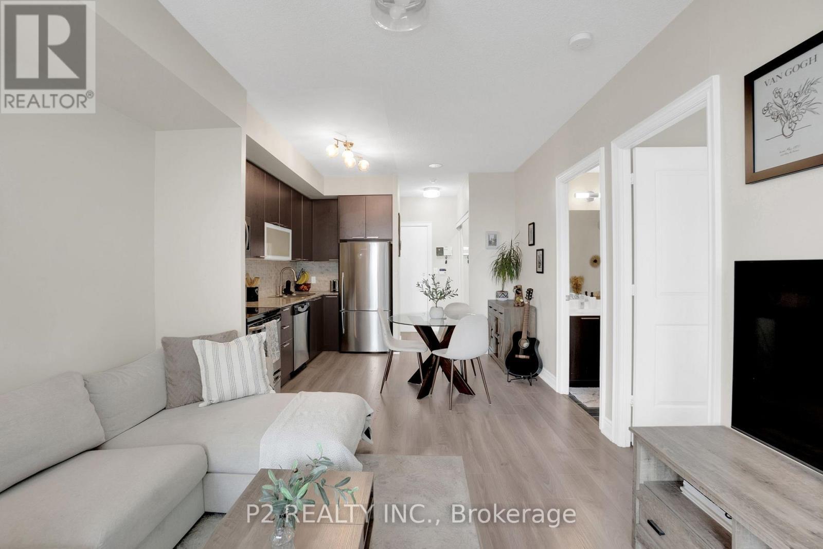 1002 - 16 Brookers Lane E, Toronto, ON - Indoor Photo Showing Living Room