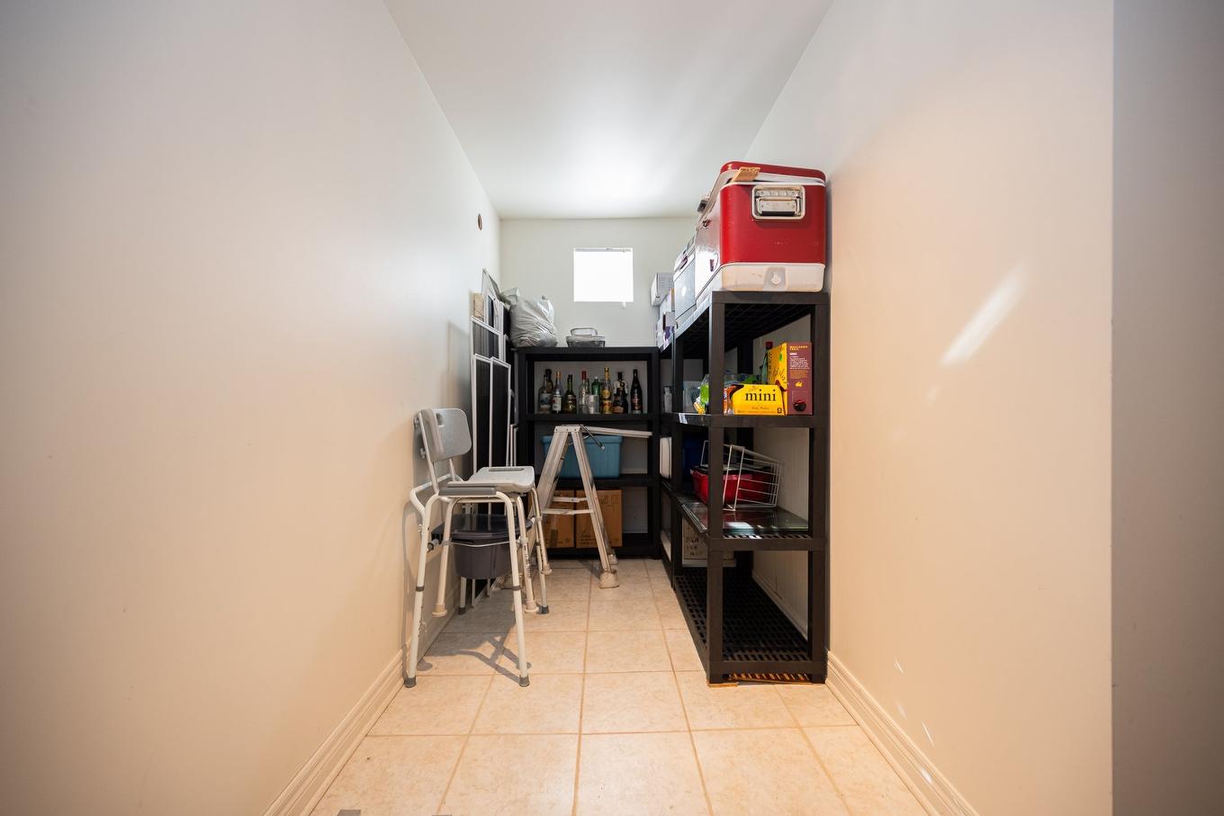 Storage - 4402 Rue Martin-Plouffe, Laval (Chomedey), QC - Indoor Photo Showing Other Room