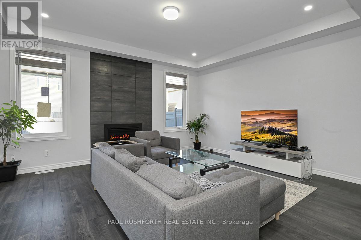Living Room - 45 Mudminnow Crescent, Ottawa, ON - Indoor Photo Showing Living Room With Fireplace