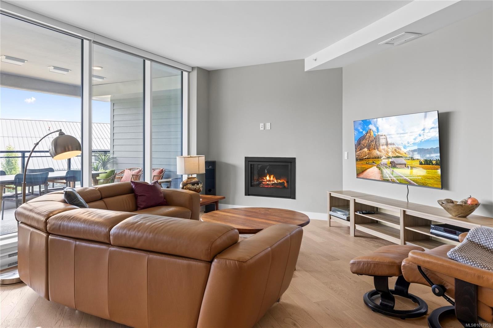 202-3529 Dolphin Dr, Nanoose Bay, BC - Indoor Photo Showing Living Room With Fireplace