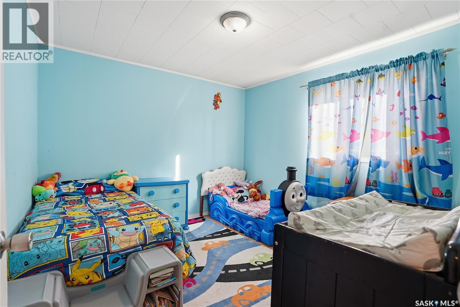 620 Miles Street, Asquith, SK - Indoor Photo Showing Bedroom