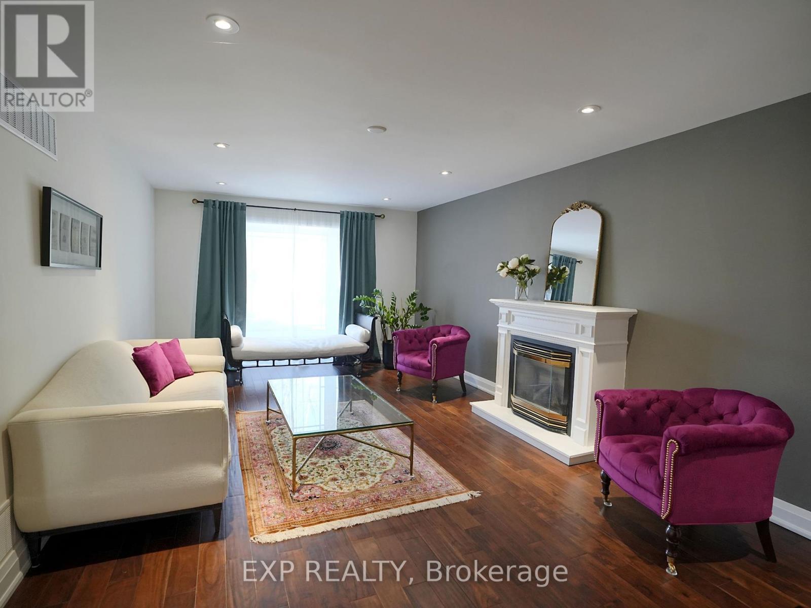 38 Tarbert Road, Toronto, ON - Indoor Photo Showing Living Room With Fireplace