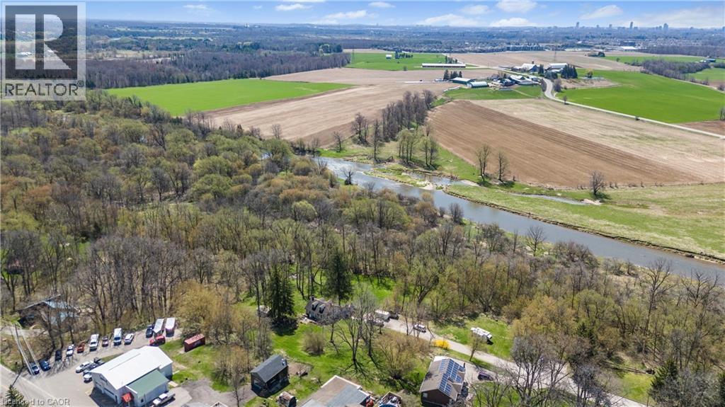 Birds eye view of property with a water view - 36 Elgin E/S Street W, Conestogo, ON - Outdoor With View