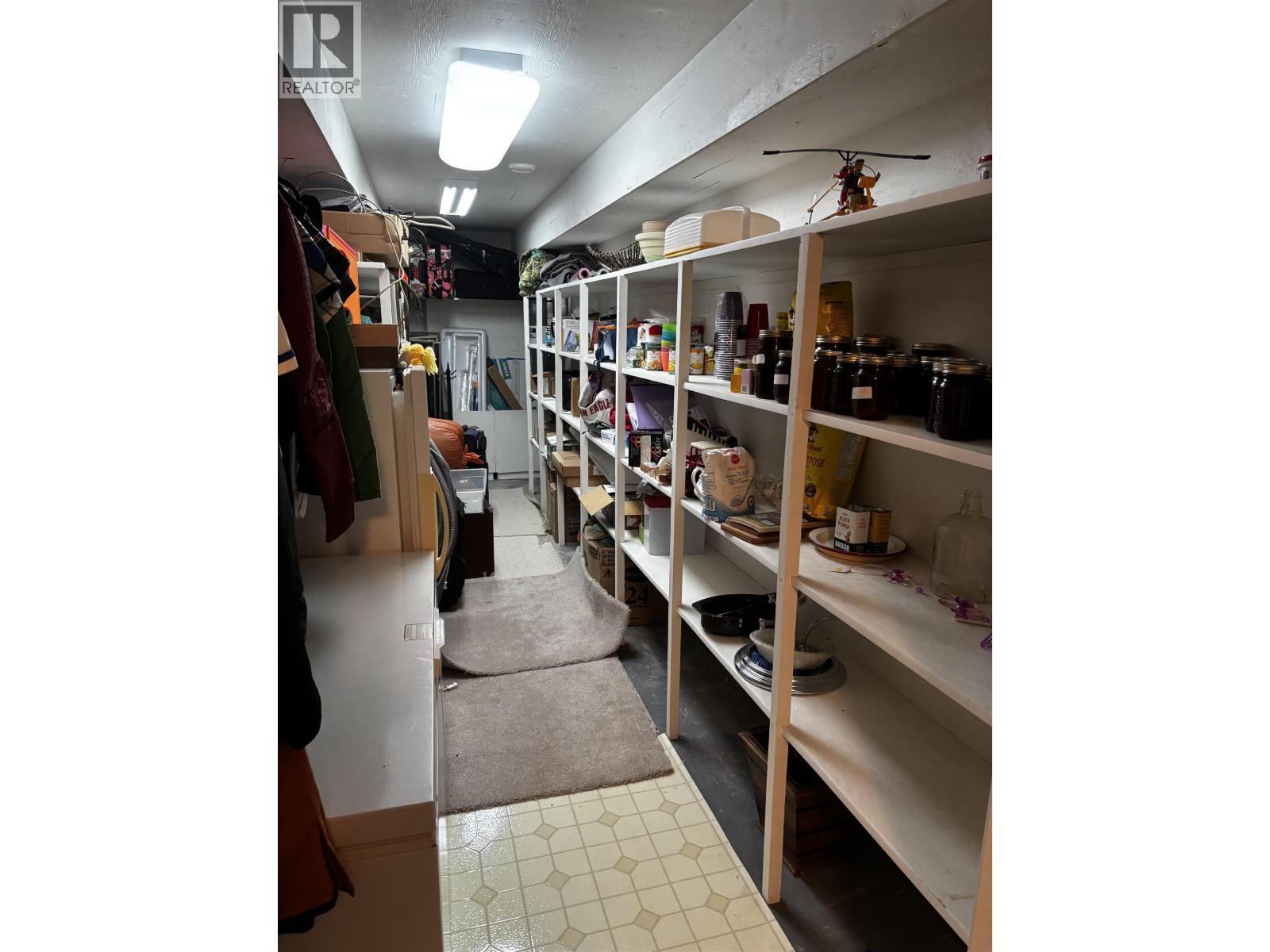 12762 Old Hope Road, Charlie Lake, BC - Indoor With Storage