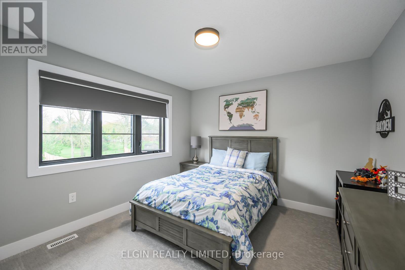 107 Optimist Drive, Southwold, ON - Indoor Photo Showing Bedroom