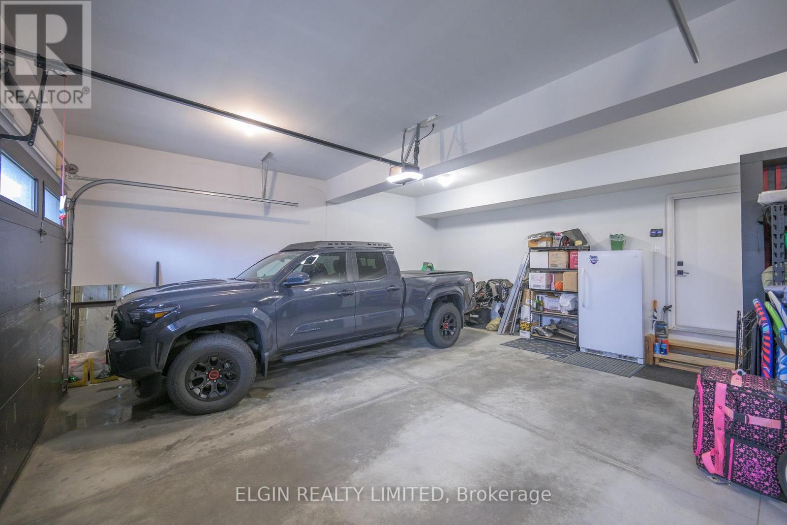 107 Optimist Drive, Southwold, ON - Indoor Photo Showing Garage