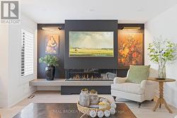 Linear Firepl.w/Quartz bench & art niches -