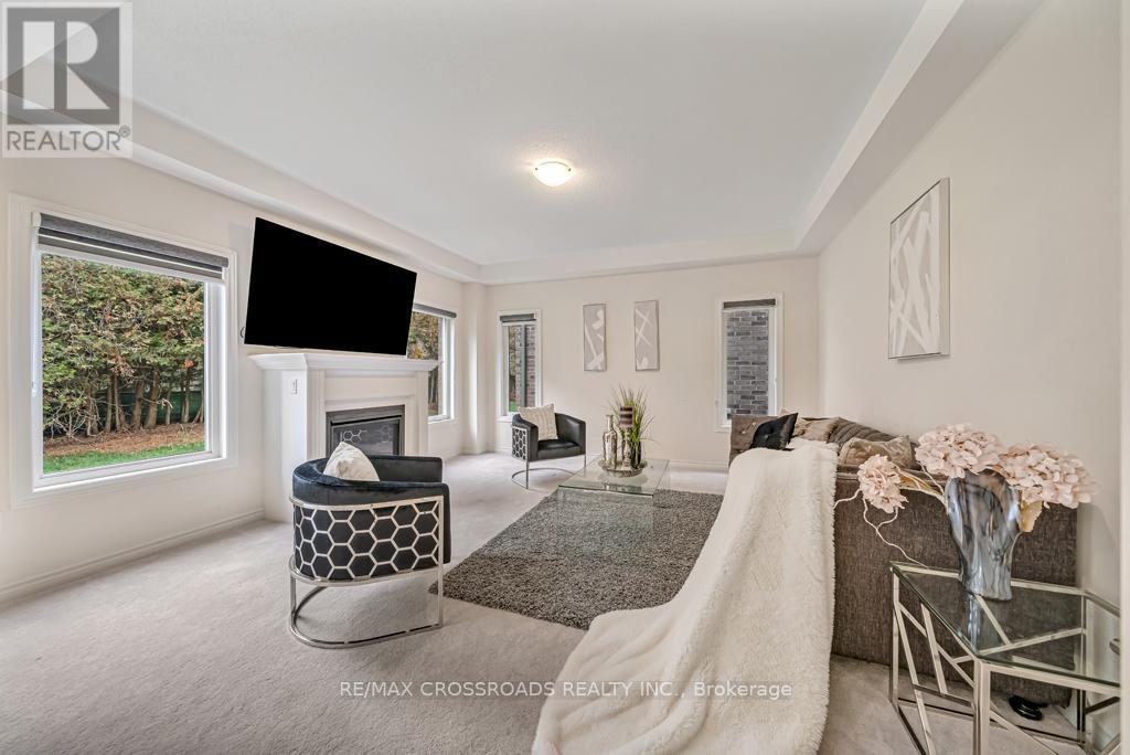 118 North Garden Boulevard, Scugog, ON - Indoor Photo Showing Bedroom With Fireplace