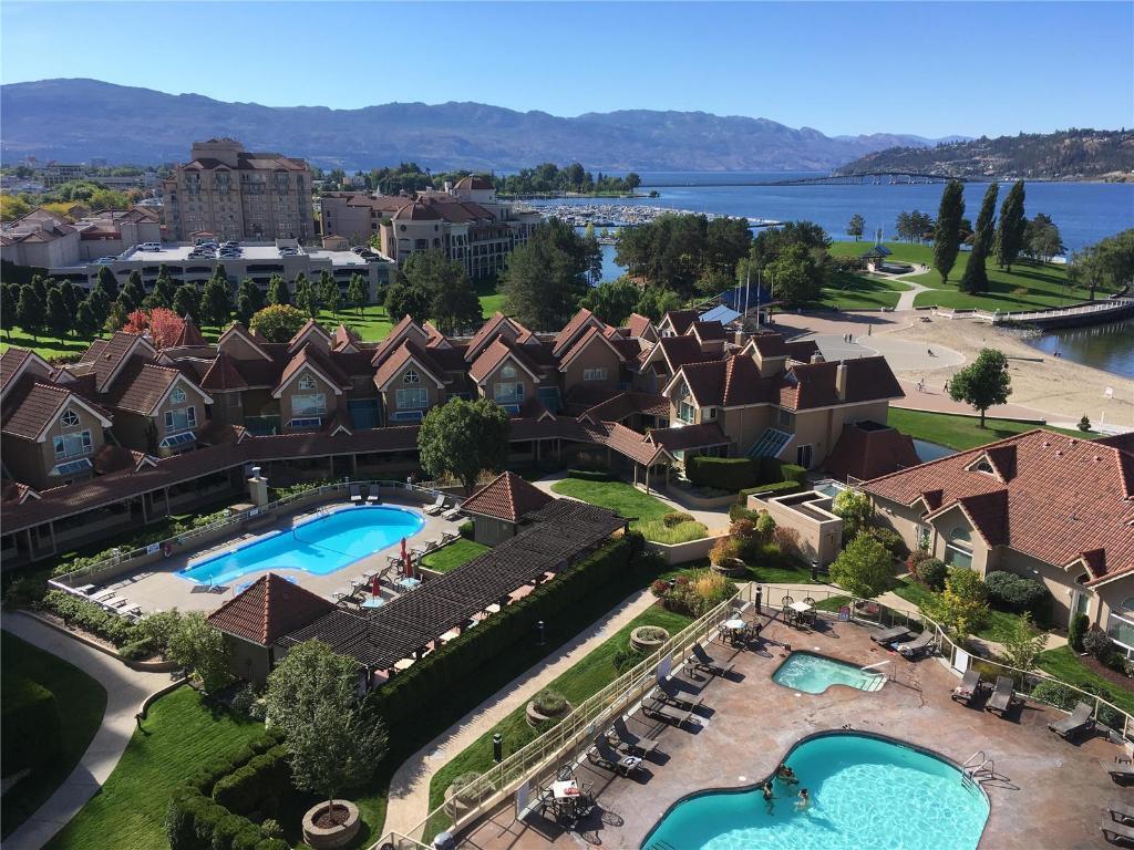 101-1128 Sunset Drive, Kelowna, BC - Outdoor With Body Of Water With In Ground Pool With View