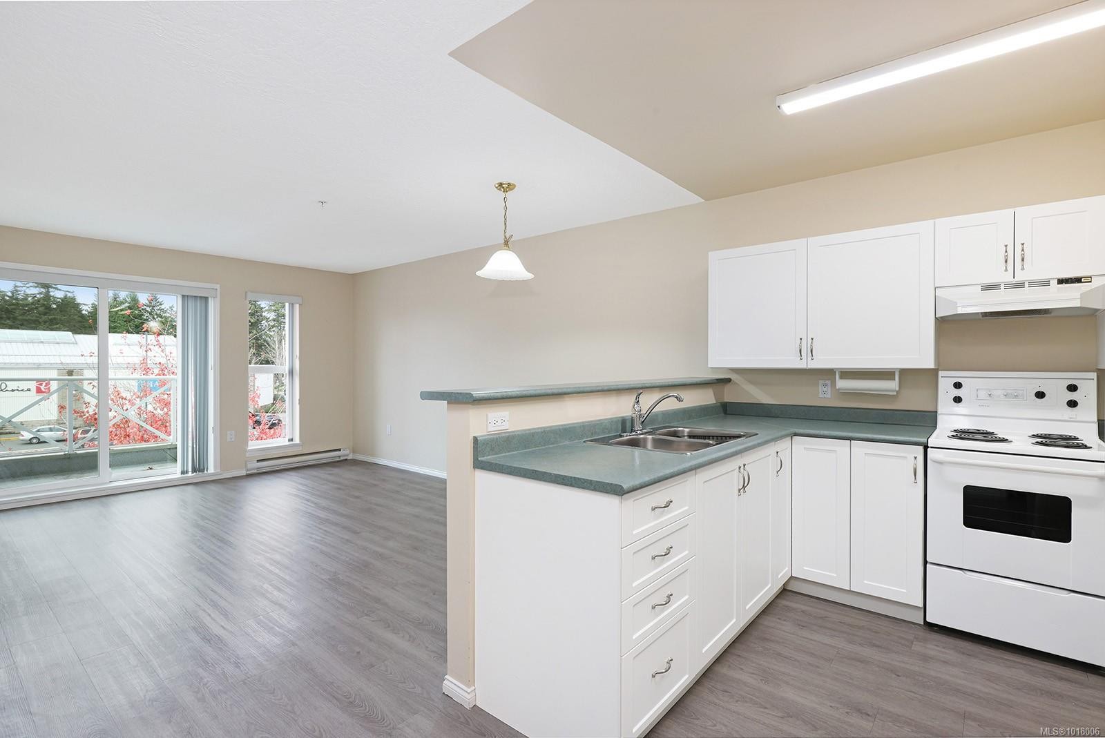 403-1683 Balmoral Ave, Comox, BC - Indoor Photo Showing Kitchen With Double Sink