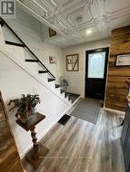 FRONT ENTRY AND STAIRWAY -