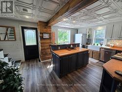 LRG BRIGHT KITCHEN W/POT LIGHTS, ANTIQUE CEILING -