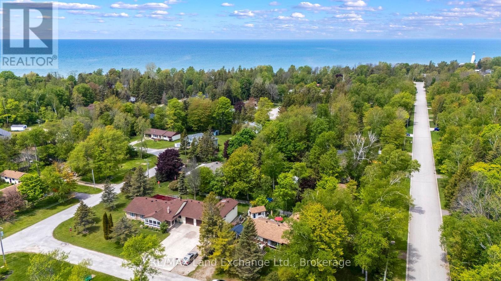 Aerial view showing proximity to Lake Huron. - 401 Winnebago Road, Huron-Kinloss, ON - Outdoor With Body Of Water With View