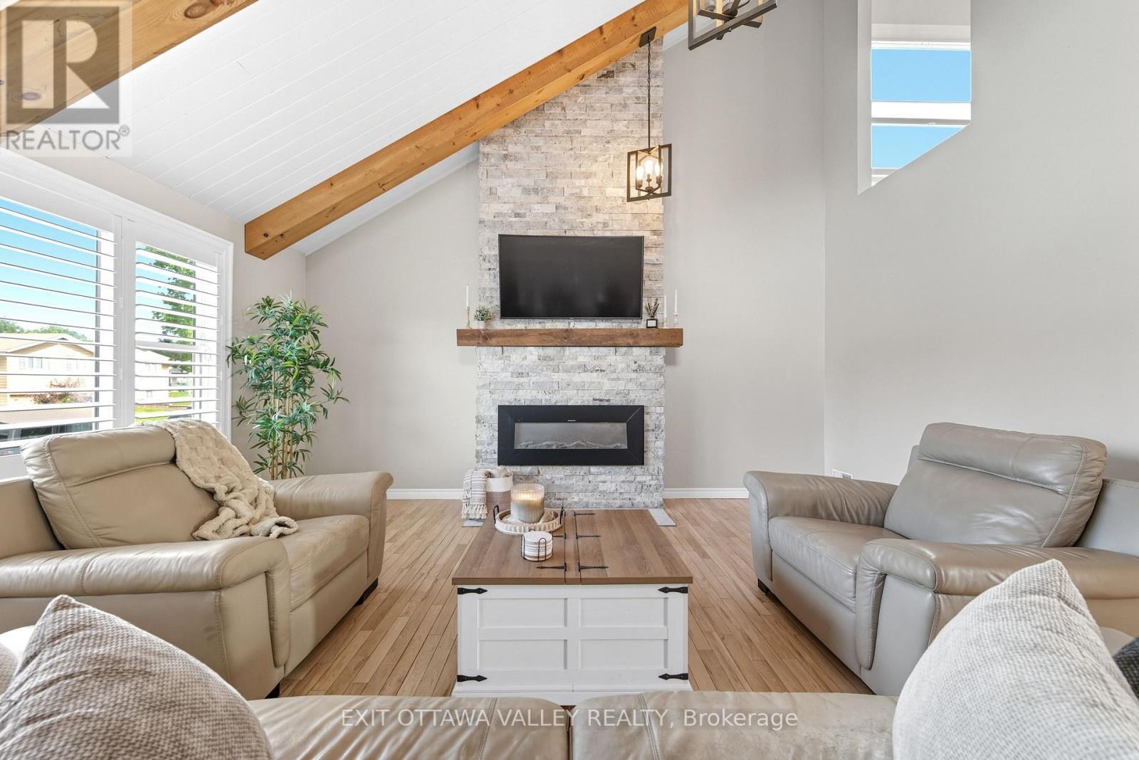 36 Thomas Street, Deep River, ON - Indoor Photo Showing Living Room With Fireplace