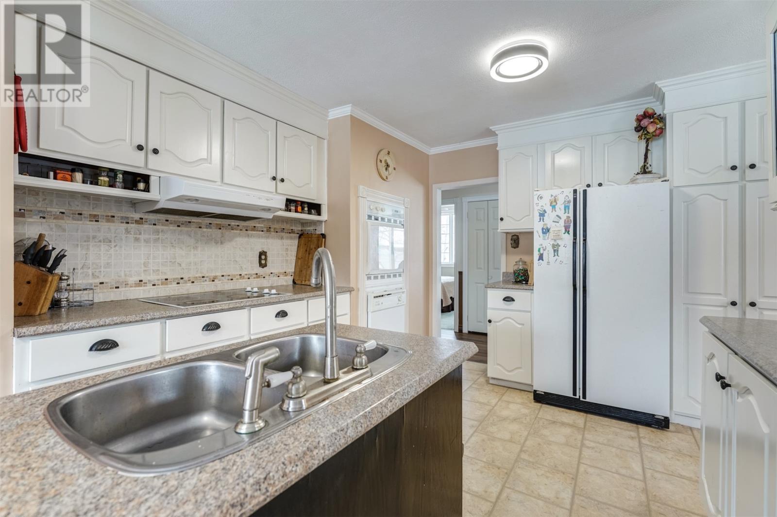 18 Ryans Road, Spaniards Bay, NL - Indoor Photo Showing Kitchen With Double Sink