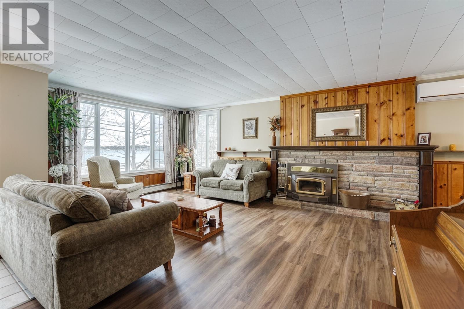 18 Ryans Road, Spaniards Bay, NL - Indoor Photo Showing Living Room With Fireplace