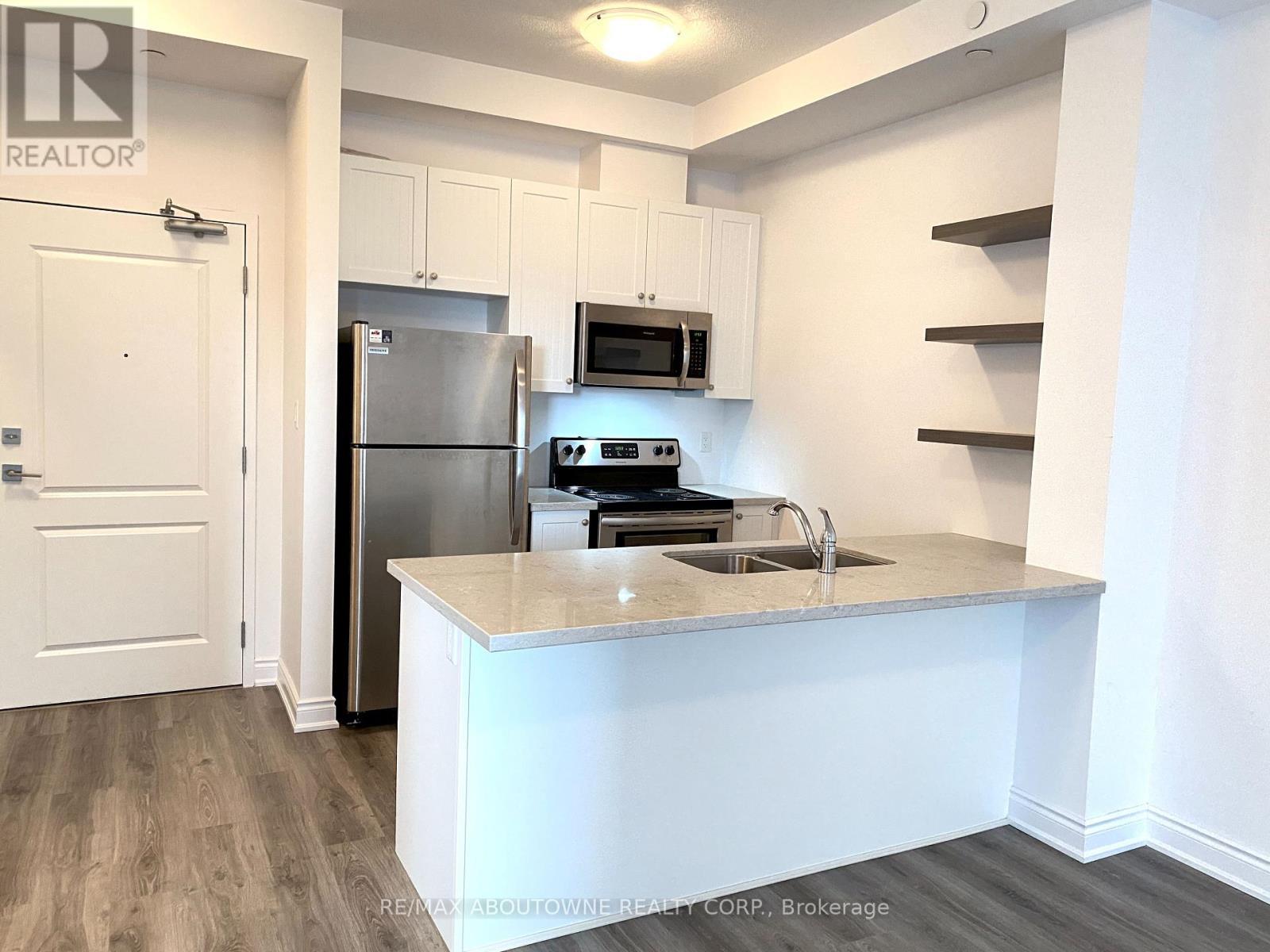 606 - 125 Shoreview Place, Hamilton, ON - Indoor Photo Showing Kitchen With Double Sink