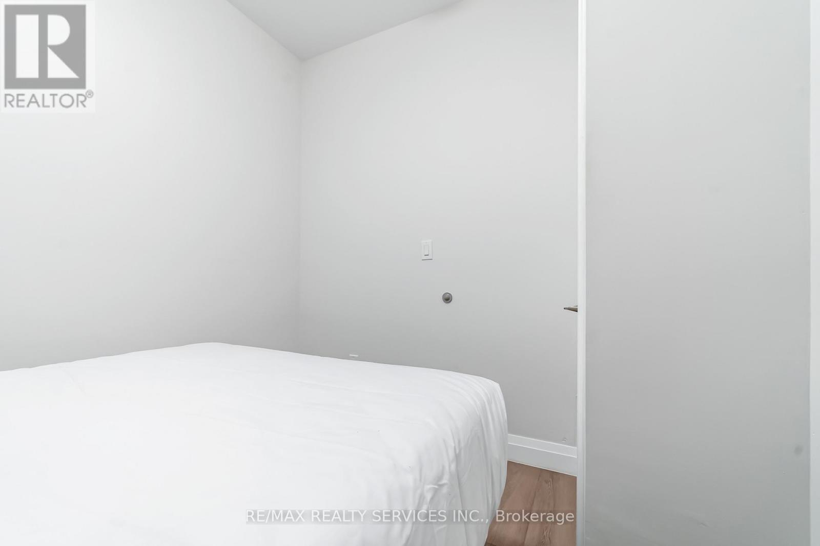 #8 - 30 Dean Park Road, Toronto, ON - Indoor Photo Showing Bedroom