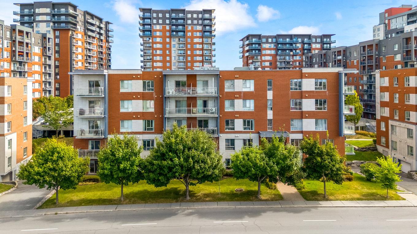 Façade - 301-1445 Boul. Le Corbusier, Laval (Laval-Des-Rapides), QC - Outdoor With Balcony With Facade