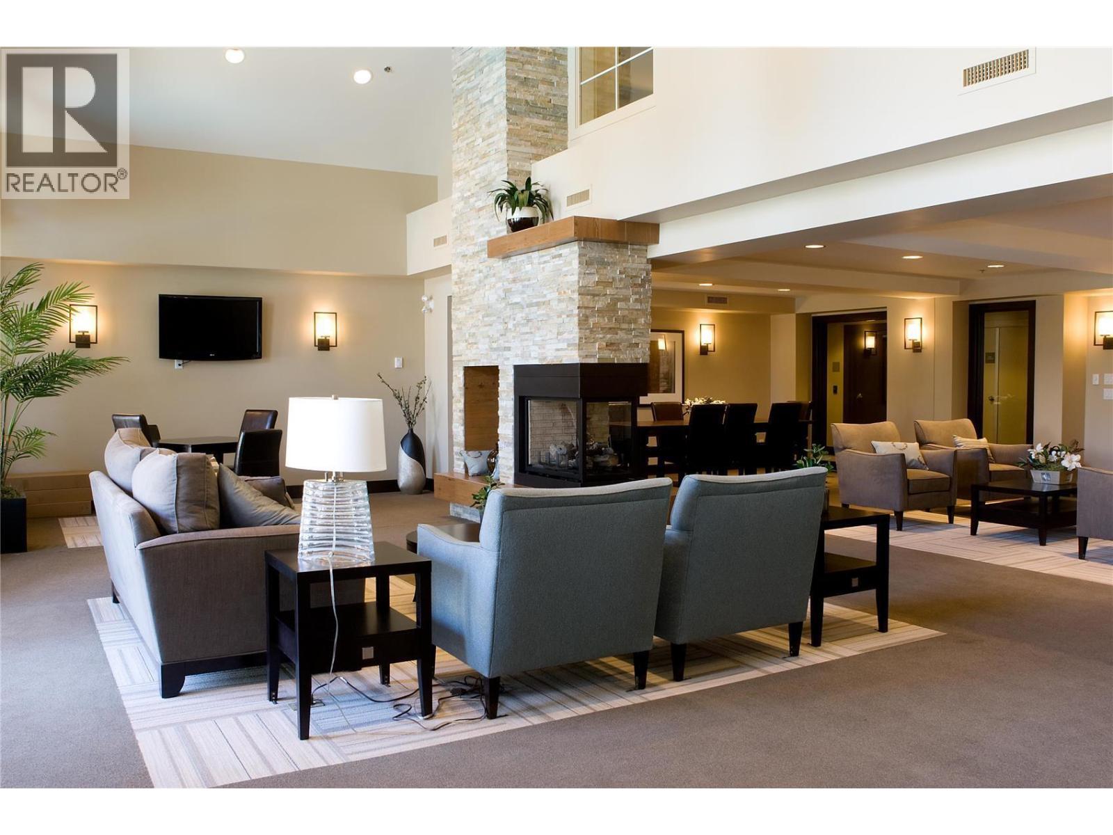 Cascade Club - 1099 Sunset Drive Unit# 424, Kelowna, BC - Indoor With Fireplace