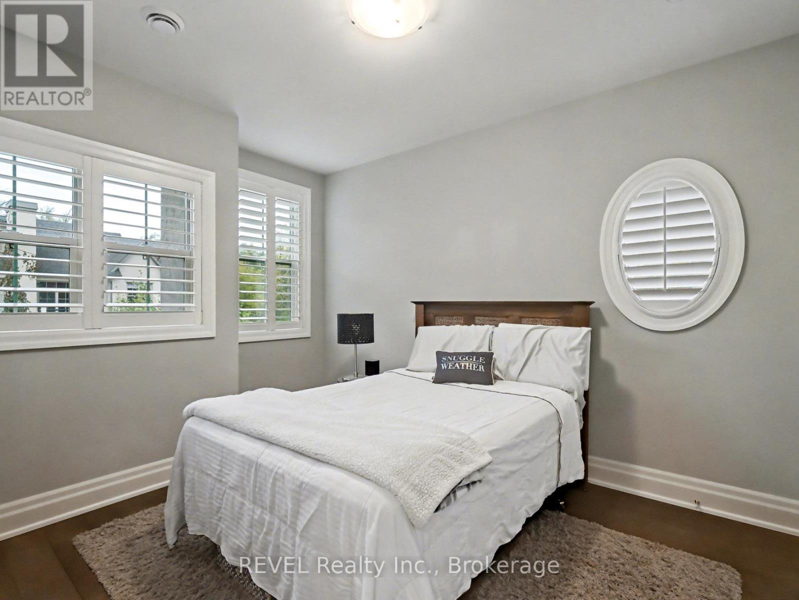A7 - 7 Aberdeen Lane S, Niagara-On-The-Lake (Town), ON - Indoor Photo Showing Bedroom
