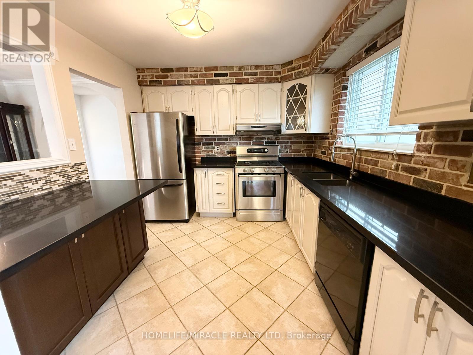 Main Floor Kitchen - 91 Garside Crescent, Brampton, ON - Indoor Photo Showing Kitchen With Double Sink