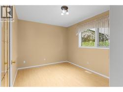 BEDROOM 2 of 3 - On Main Level. -