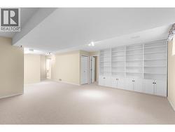 REC ROOM - With Home Theatre Alcove/Built-in Shelving. -