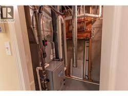UTILITY ROOM - New high-efficiency Furnace with A/C and Hot Water Tank. -