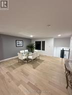 Large dinning area open to below entrance. -