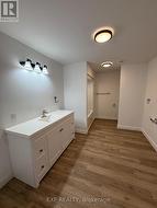 4-pce basement bathroom with washer/dryer hookups. -