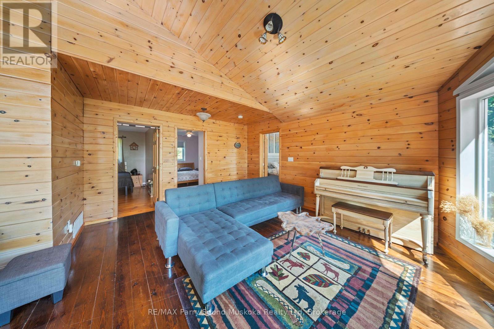 23 Shady Maple Trail, Whitestone, ON - Indoor With Fireplace