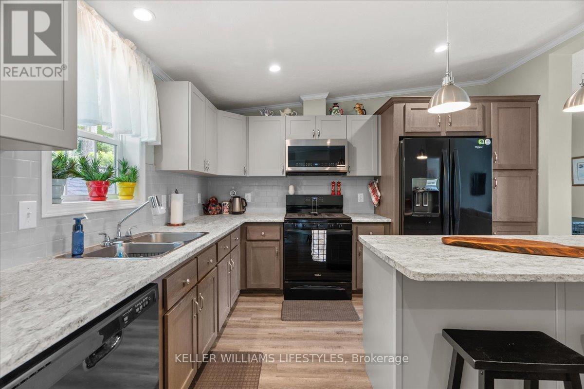 13 Kellestine Drive, Strathroy-Caradoc (Se), ON - Indoor Photo Showing Kitchen With Double Sink