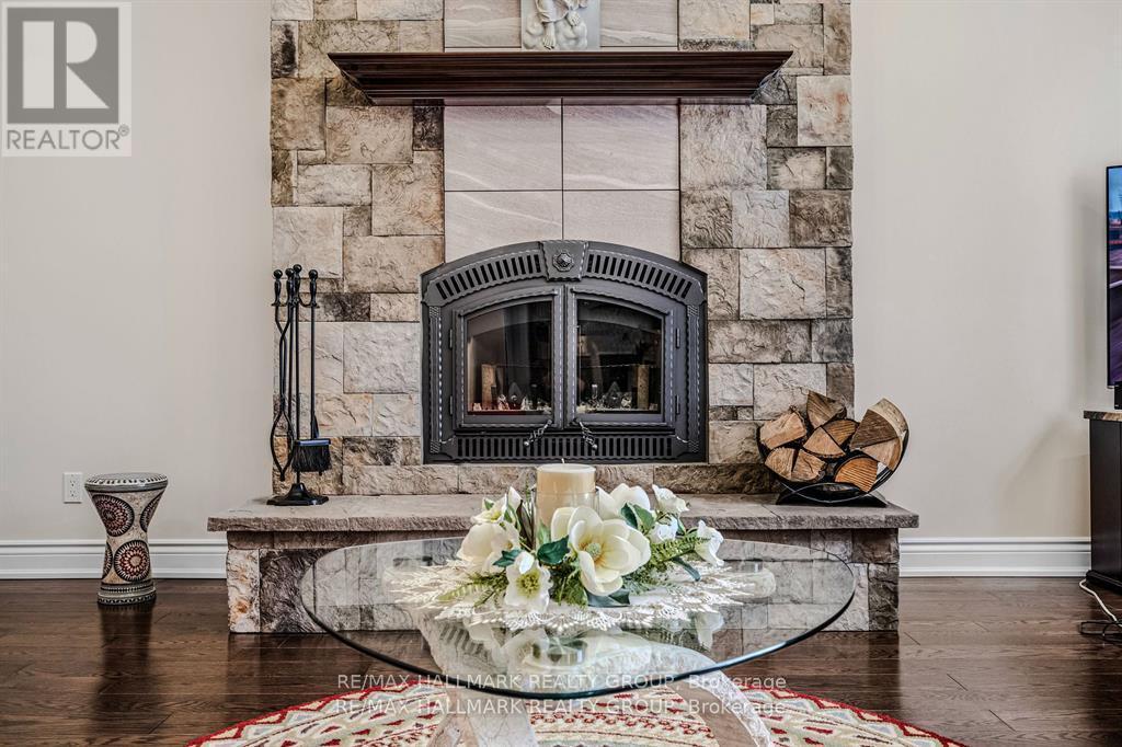 699 Ballycastle Crescent, Ottawa, ON - Indoor Photo Showing Living Room With Fireplace
