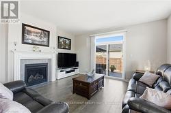 Gas Fireplace - hardwood floors -