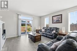 Sliding doors to backyard patio and pergola -