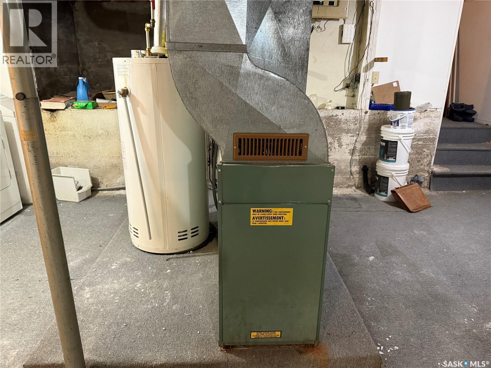 100 Main Street, Aylesbury, SK - Indoor Photo Showing Basement