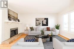 Livingroom with fireplace & picture window -