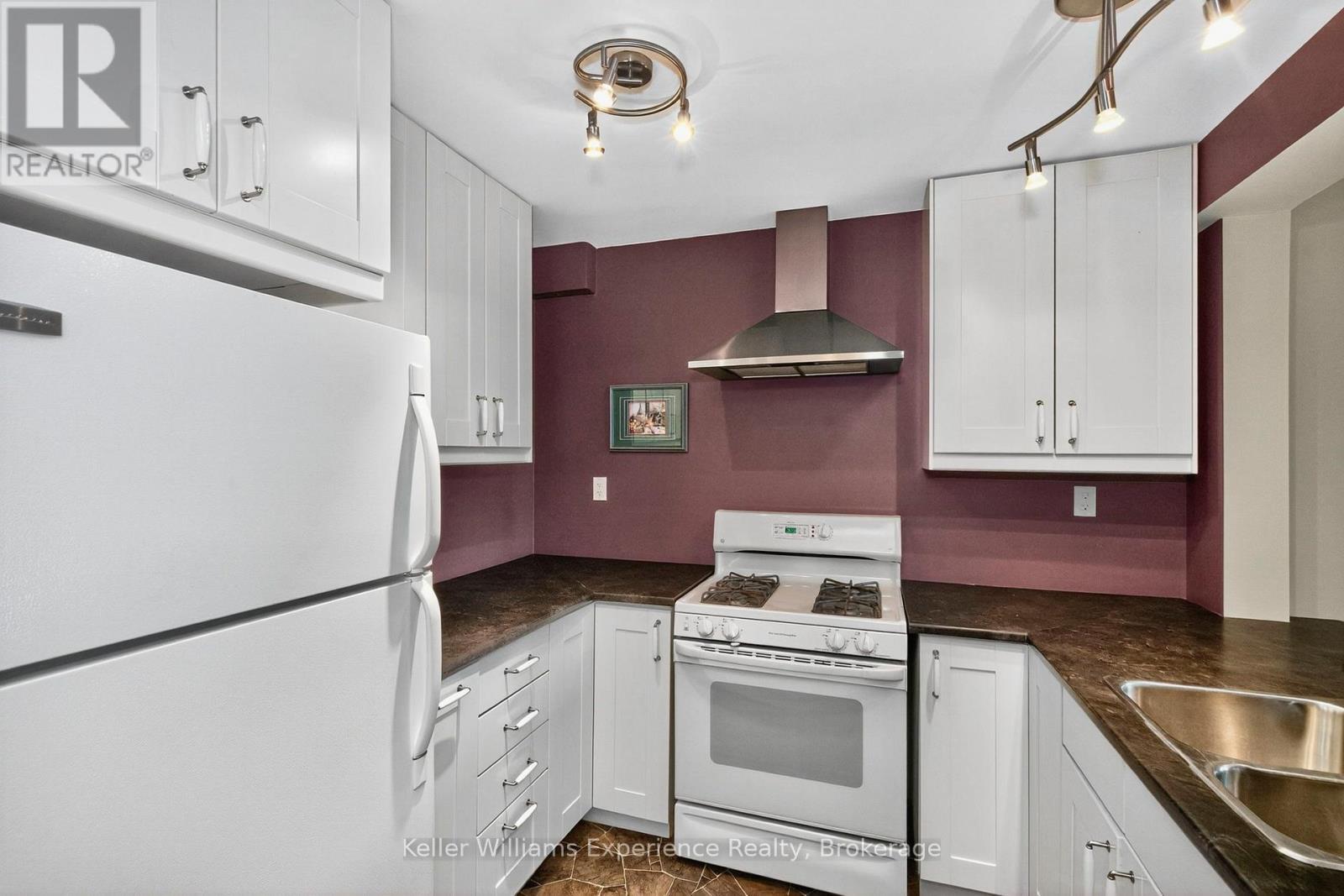 56 - 778 William Street, Midland, ON - Indoor Photo Showing Kitchen With Double Sink