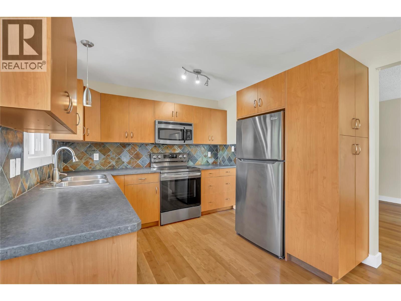 8299 Prairie Valley Road, Summerland, BC - Indoor Photo Showing Kitchen With Double Sink