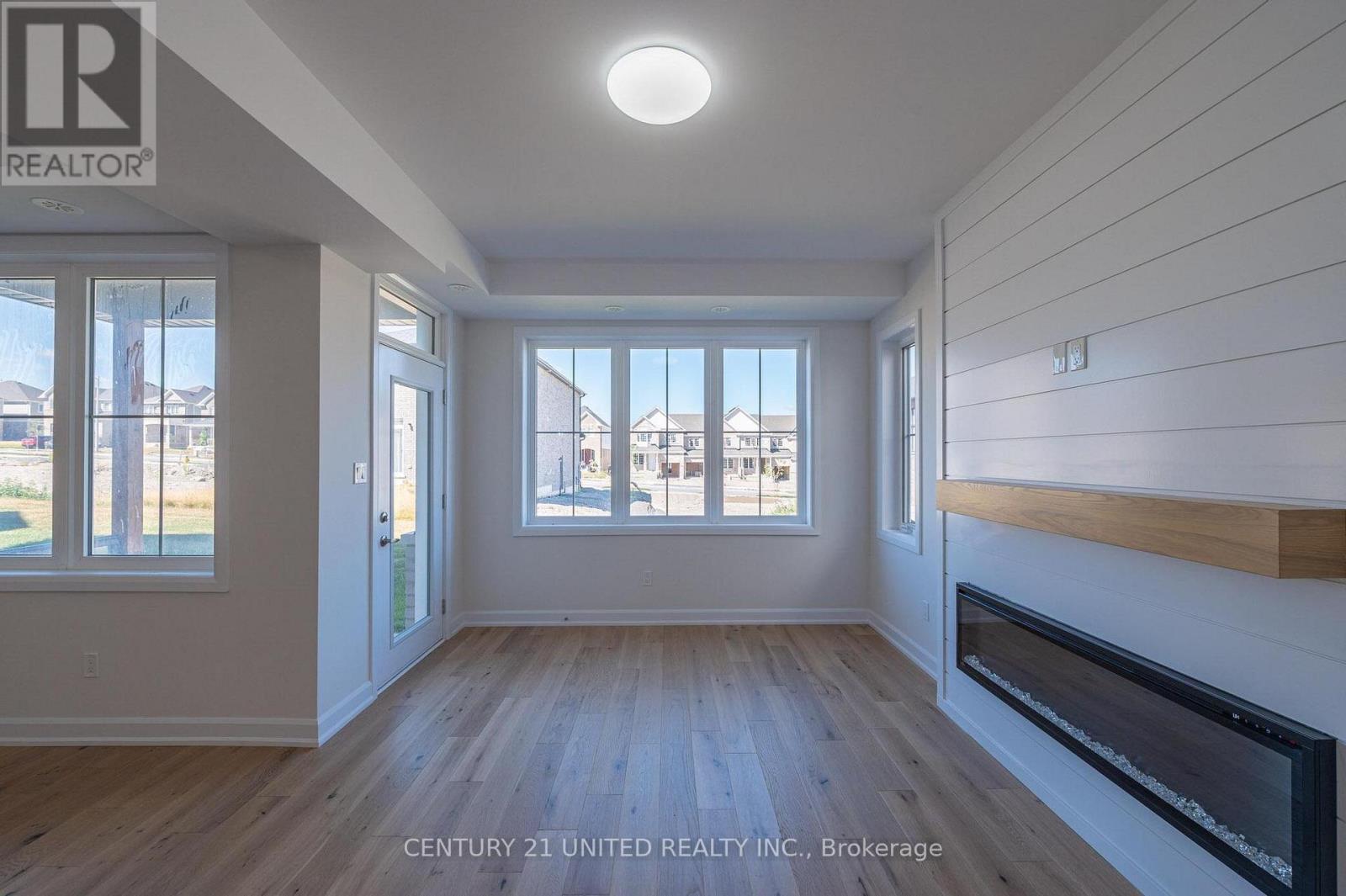 305 Mullighan Gardens, Peterborough (Monaghan Ward 2), ON - Indoor Photo Showing Other Room With Fireplace
