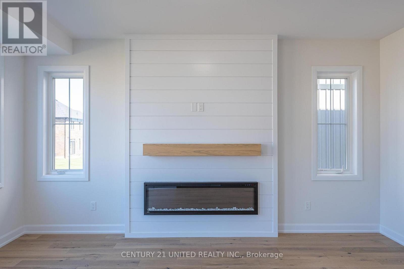 305 Mullighan Gardens, Peterborough (Monaghan Ward 2), ON - Indoor Photo Showing Other Room With Fireplace