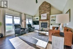 Custom finished Napoleon fireplace with built-ins. -