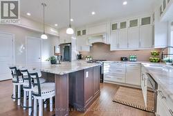 Quartz counters & quality finished throughout. -